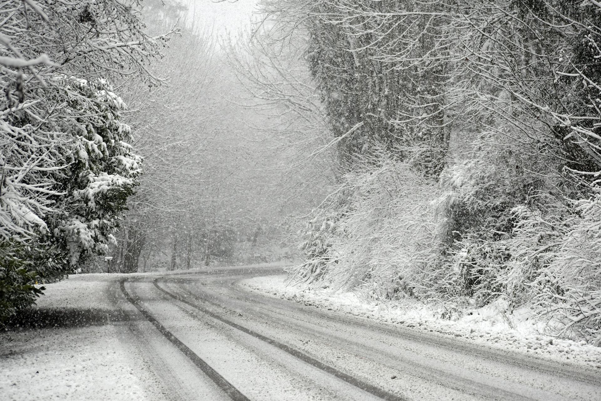 Snow-covered mountain road conditions